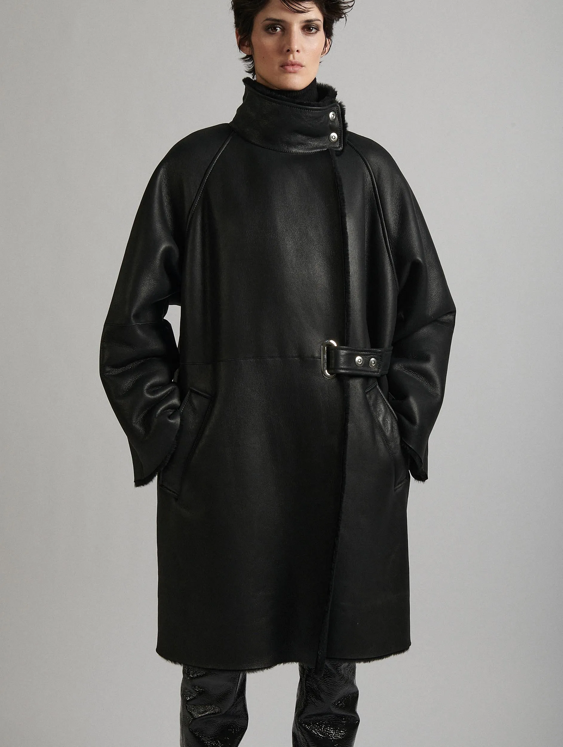 Black shearling high-collar coat