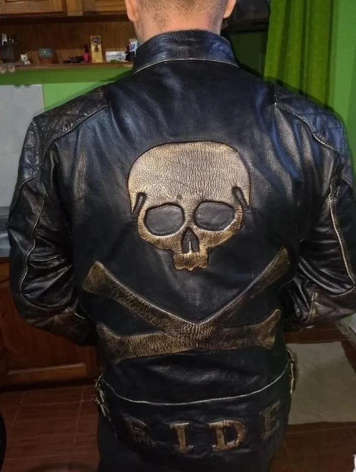 Men's Skull Crossbones Genuine Leather Motorcycle Jacket with Quilted Sleeves and RIDE Patch